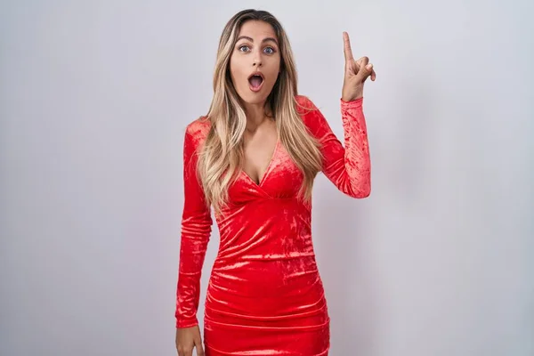 Young Blonde Woman Wearing Sexy Party Dress Pointing Finger Successful — Stock Photo, Image