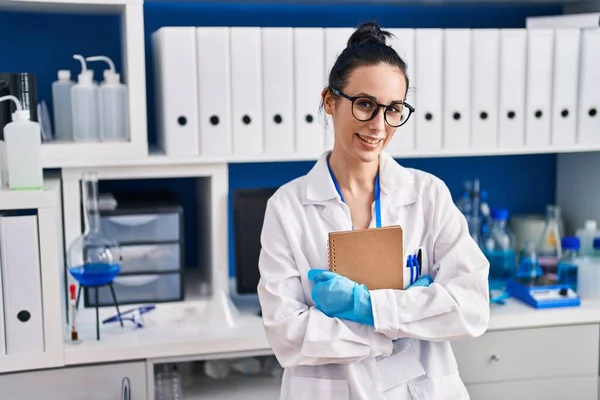 Young Caucasian Woman Scientist Smiling Confident Holding Notebook Laboratory — Stok fotoğraf