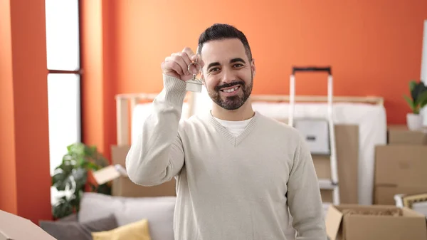 Young Hispanic Man Smiling Confident Holding Key New Home — Stockfoto