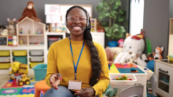 African Woman Preschool Teacher Video Call Using Headset Kindergarten — ストック写真