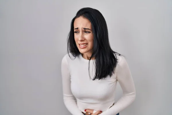 Hispanic Woman Standing Isolated Background Hand Stomach Because Indigestion Painful — Stock Photo, Image