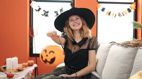 Young Blonde Woman Wearing Halloween Costume Holding Pumpkin Basket Home — Φωτογραφία Αρχείου