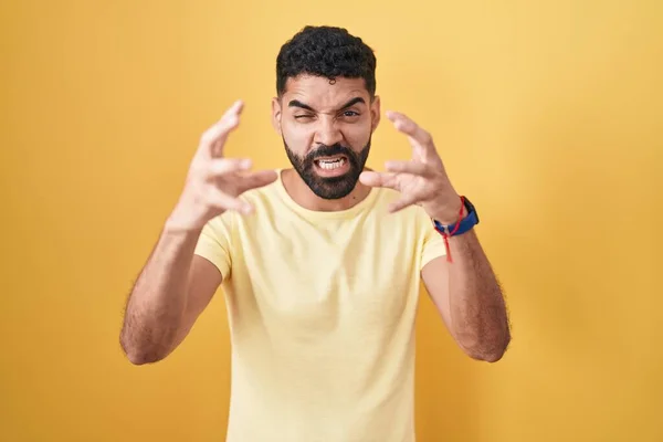 Hispanic Man Beard Standing Yellow Background Shouting Frustrated Rage Hands — 스톡 사진