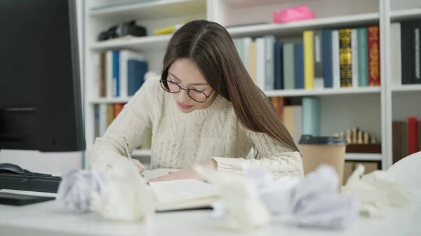 Young Beautiful Hispanic Woman Student Tired Writing Notebook Library University — Foto Stock