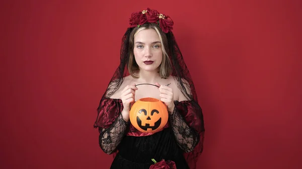 Young Blonde Woman Wearing Katrina Costume Holding Halloween Pumpkin Basket — Stok fotoğraf