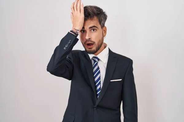 Young Hispanic Man Tattoos Wearing Business Suit Tie Surprised Hand — Stock Photo, Image