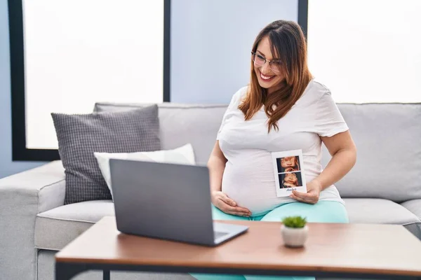 Young Pregnant Woman Having Video Call Holding Baby Ecography Home — 图库照片
