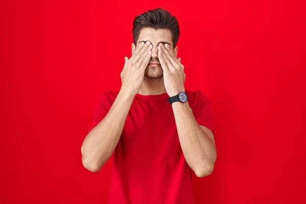 Young Hispanic Man Standing Red Background Rubbing Eyes Fatigue Headache — Stock Fotó