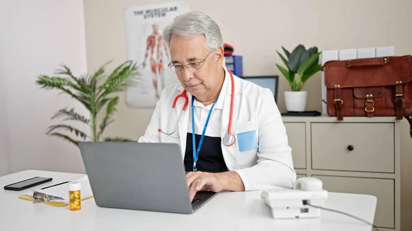 Middle Age Man Grey Hair Doctor Using Laptop Working Clinic — Stock Photo, Image