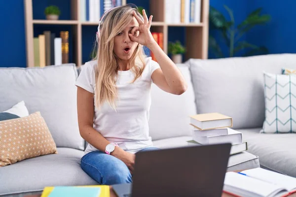 Young Blonde Woman Studying Using Computer Laptop Home Doing Gesture — Stock Photo, Image