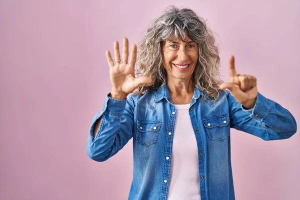 Middle Age Woman Standing Pink Background Showing Pointing Fingers Number — Stock Photo, Image