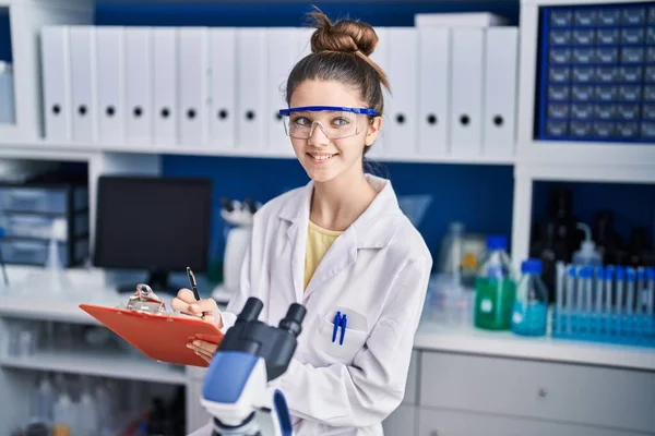 Adorable Girl Scientist Writing Document Working Laboratory — Stock fotografie
