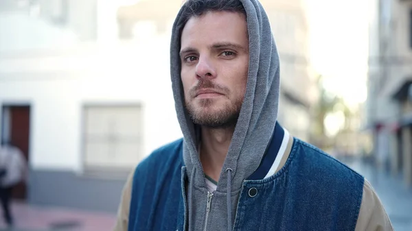 Young Caucasian Man Standing Wearing Hoodie Serious Expression Street — Stock Photo, Image
