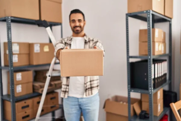 Young Hispanic Man Ecommerce Business Worker Holding Package Standing Office — 스톡 사진