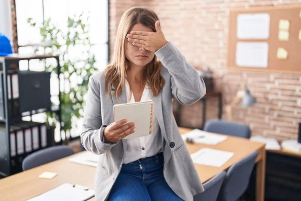 Young Hispanic Woman Working Office Wearing Glasses Covering Eyes Hand — Stock Photo, Image
