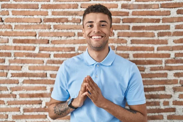 Brazilian Young Man Standing Brick Wall Hands Together Fingers Crossed — Stock Photo, Image