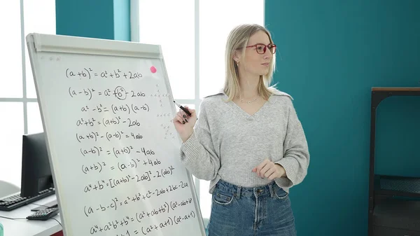 Young Blonde Woman Teaching Maths Magnetic Board Library University - Stock-foto