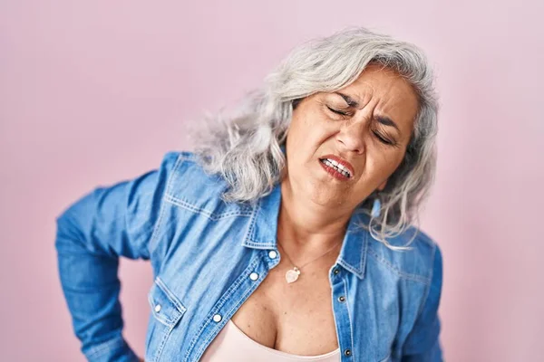 Middle Age Woman Grey Hair Standing Pink Background Suffering Backache — стоковое фото