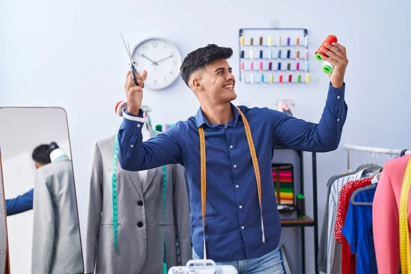 Young Hispanic Man Tailor Smiling Confident Holding Scissors Thread Clothing — Stock Fotó