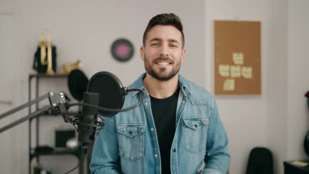 Young Hispanic Man Artist Smiling Confident Music Studio — Stock video