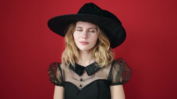 Young Blonde Woman Wearing Witch Costume Using Smartphone Isolated Red — Vídeo de Stock