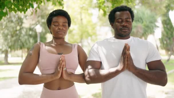 African American Man Woman Couple Smiling Confident Doing Yoga Exercise — Stok Video