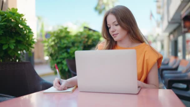Young Woman Using Laptop Writing Notebook Coffee Shop Terrace — Vídeos de Stock