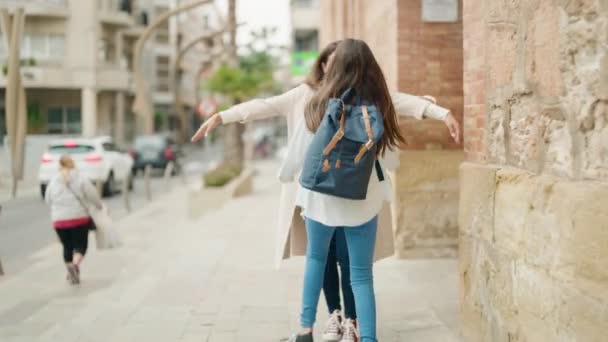 Mother Daughter Smiling Confident Hugging Each Other Kissing Street — Stock Video