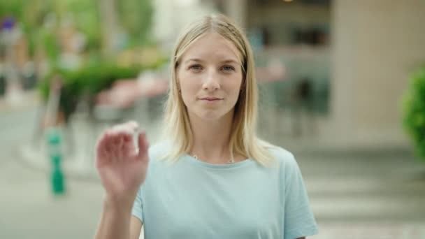 Young Blonde Woman Doing Stop Gesture Hand Street — Stock video