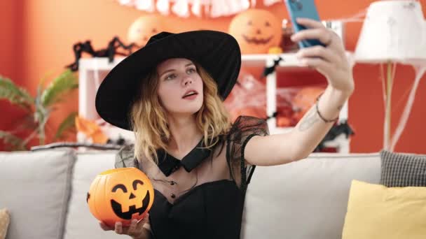 Young Blonde Woman Holding Halloween Pumpkin Basket Make Selfie Smartphone — Stock Video