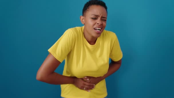 African American Woman Suffering Stomach Ache Standing Isolated Blue Background — Vídeo de Stock