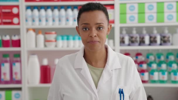 African American Woman Pharmacist Smiling Confident Speaking Pharmacy — 비디오