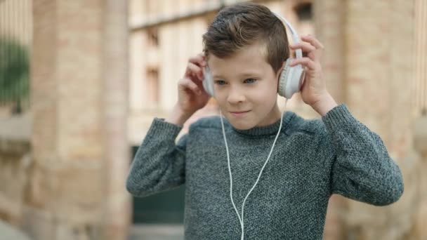 Blond Child Smiling Confident Listening Music Dancing Street — Stok video