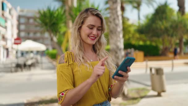 Young Woman Smiling Confident Making Photo Smartphone Street — Stock videók