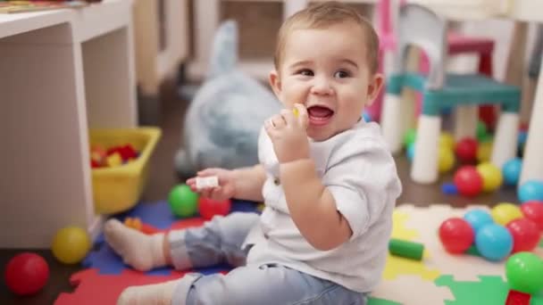 Adorable Toddler Playing Toys Sitting Floor Kindergarten — Stock video