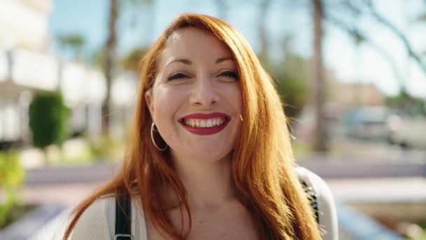Young Redhead Woman Smiling Confident Doing Sign Thumb Park — Vídeos de Stock