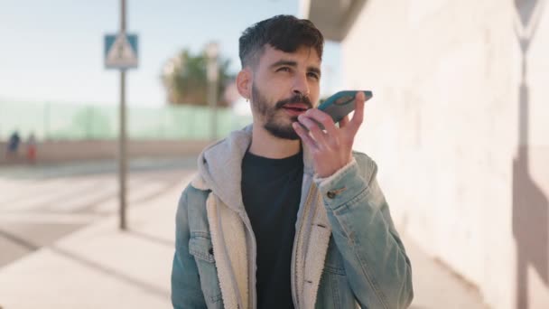Young Hispanic Man Smiling Confident Talking Smartphone Street — Stock Video