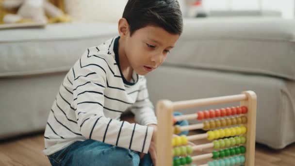 Adorable Hispanic Boy Playing Abacus Sitting Floor Home — Wideo stockowe