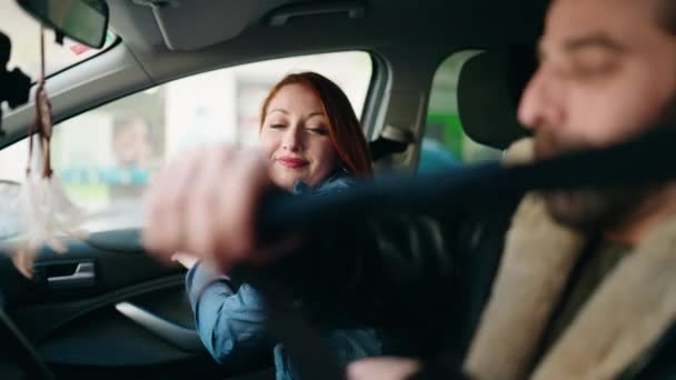 Man Woman Couple Smiling Confident Fastening Seat Belt Street — Vídeo de Stock
