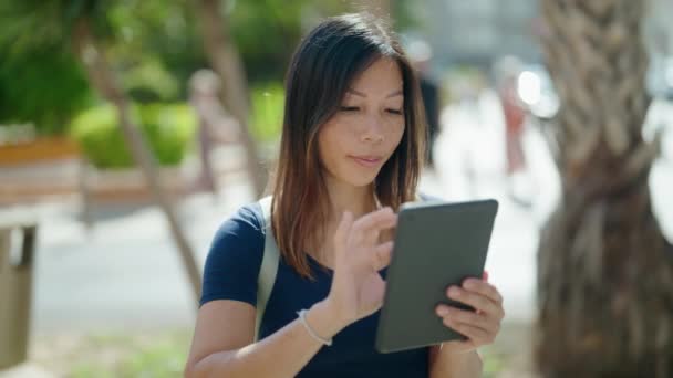 Young Asian Woman Smiling Confident Using Touchpad Street — Video