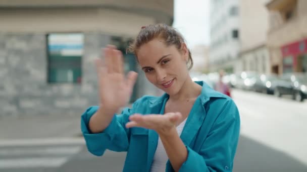 Young Woman Smiling Confident Doing Spend Money Gesture Street — Vídeo de Stock