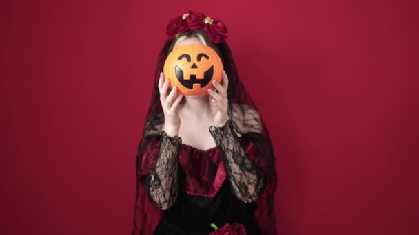 Young Blonde Woman Wearing Katrina Costume Holding Halloween Pumpkin Basket — Stock video