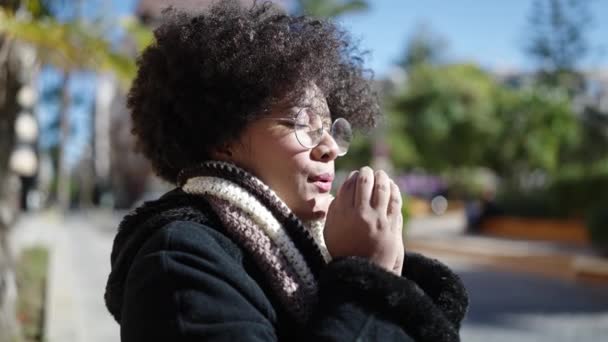 Young African American Woman Wearing Scarf Cold Weather Rubbing Hands — Stock Video