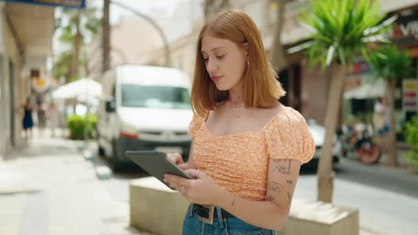 Young Redhead Woman Smiling Confident Using Touchpad Street — Stock Video