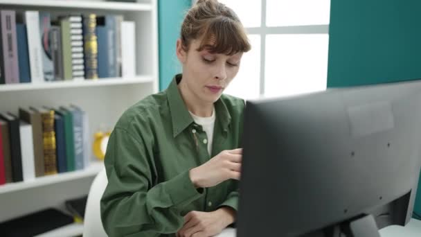 Young Caucasian Woman Using Computer Stressed Tired Library University — Vídeos de Stock