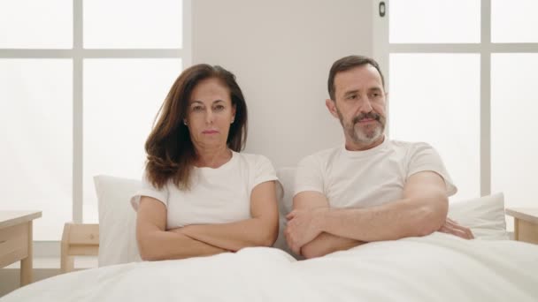 Man Woman Couple Serious Expression Sitting Bed Bedroom — Stock Video