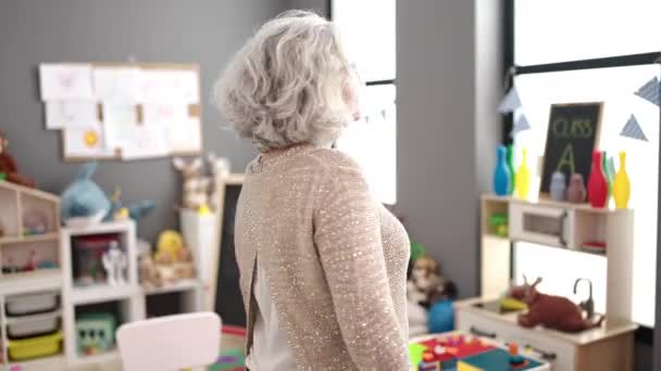 Middle Age Woman Grey Hair Preschool Teacher Smiling Confident Standing — Stock video