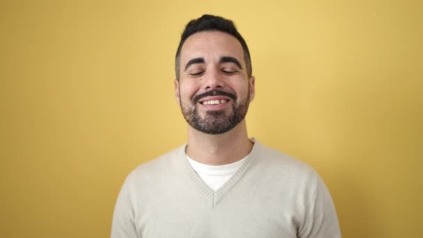 Young Hispanic Man Smiling Confident Standing Isolated Yellow Background — Stok video