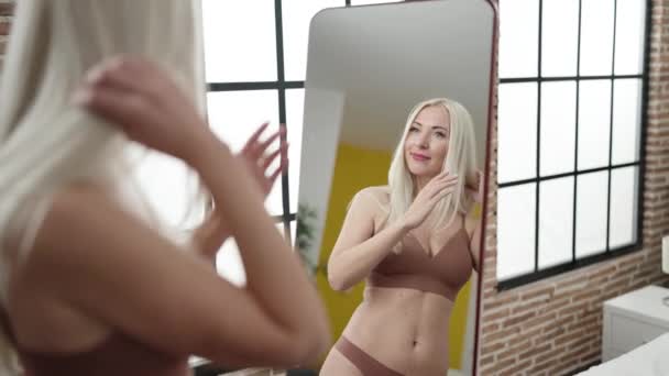 Young Blonde Woman Wearing Lingerie Looking Mirror Bedroom — Vídeos de Stock