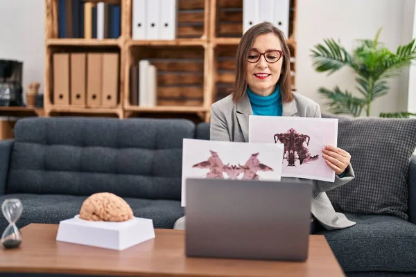 stock image Middle age woman psychologist having online rorschach test at psychology center